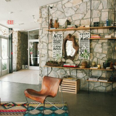 brown leather armchair near brown wooden table