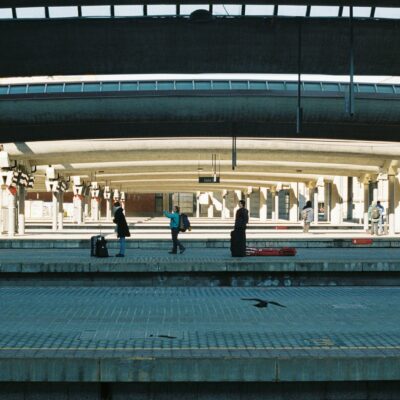 a group of people standing on top of a train platform