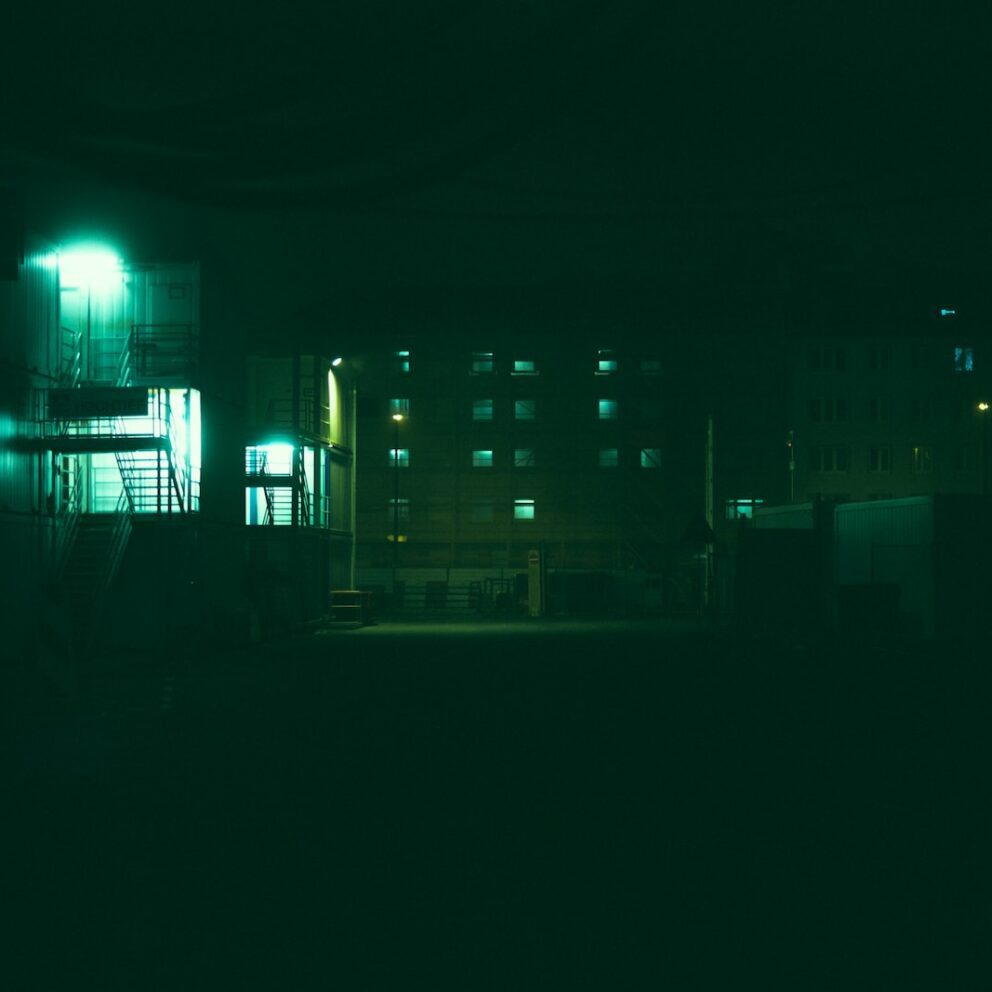a dark picture of a building at night